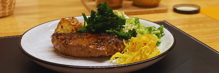 Texan BBQ steak with salad and vegetables