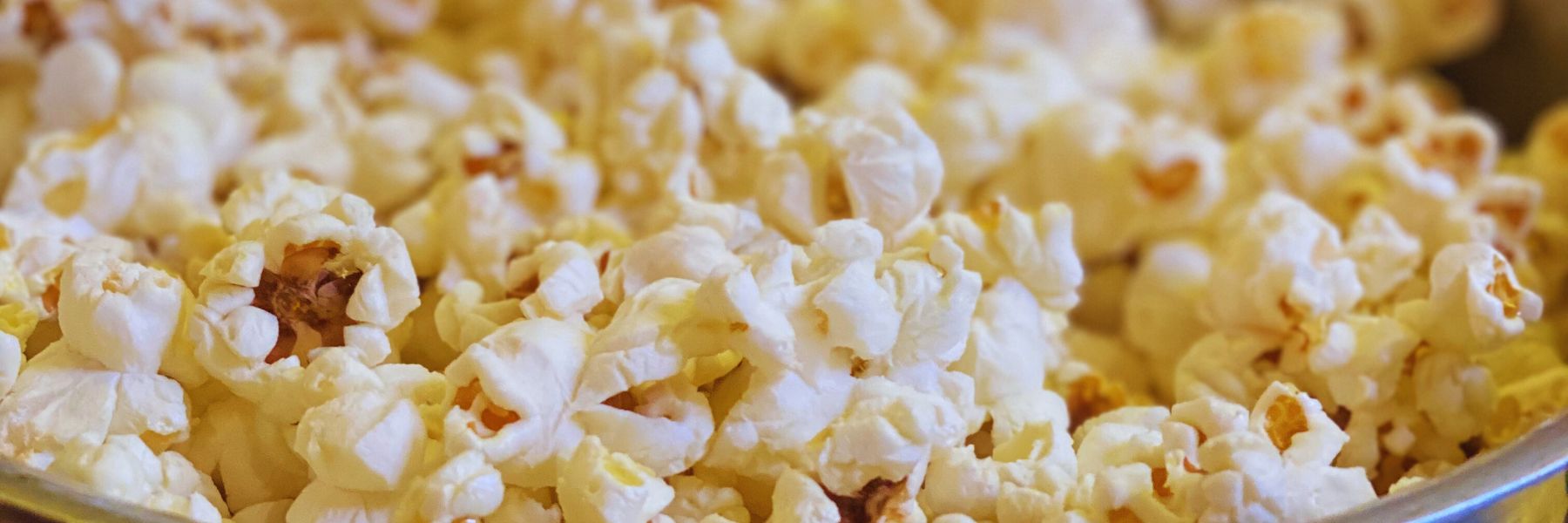 Spiced organic popcorn with butter and maple syrup